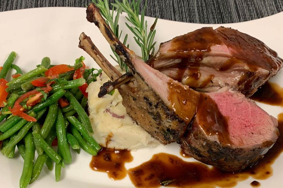 wedding catering rack of Australian lamb chop with rosemary au jus